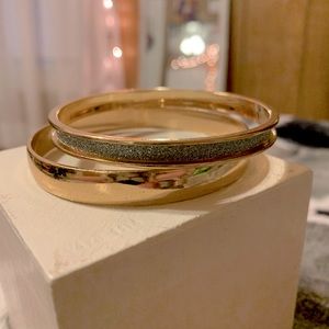 2 chunky gold bangles